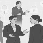 ビジネスパーソンとデータセキュリティを象徴する錠前アイコンのイメージ