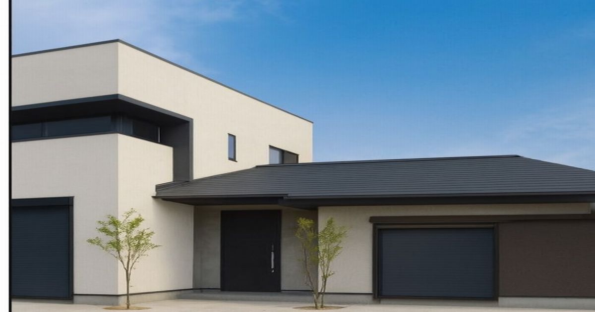 やまぜんホームズが事業停止・破産申請へ!負債21億円の衝撃と住宅業界への影響 青空の下に建つ白と黒を基調としたモダンな二階建て住宅。玄関前には細い若木が2本植えられている。